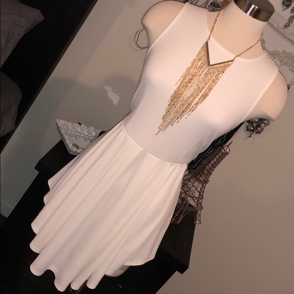 Long white peplum shirt/dress